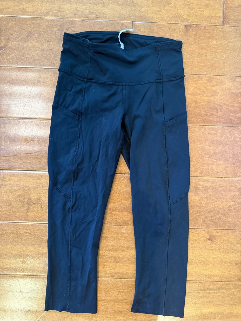 Lululemon Cropped Black Leggings with inside drawstring and side pockets size 4